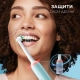 Набор электрическая зубная щетка Oral-B Pro 3 черная, насадки Cross Action 4 шт с наклейками 7